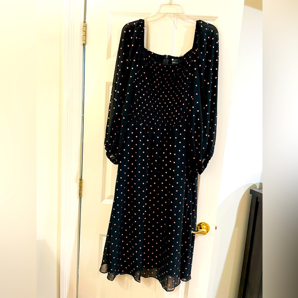 Ruched top, sheer sleeves, flowing skirt